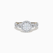 The 14K Two Tone Gold Diamond Cluster Engagement Ring features a central round diamond cluster, surrounded by a halo of smaller diamonds on an intricately designed band embellished with more diamonds.