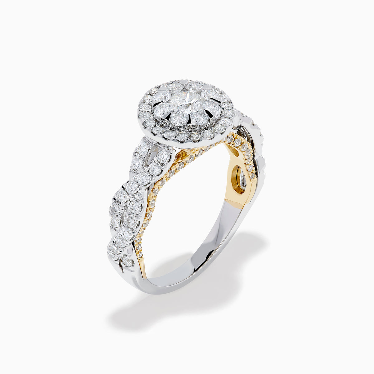 The 14K Two Tone Gold Diamond Cluster Engagement Ring features a central round diamond cluster, surrounded by a halo of smaller diamonds on an intricately designed band embellished with more diamonds.