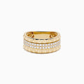 The 14K Yellow Gold Studded Diamond Band features a wide band with a geometric pyramid design and two horizontal rows of small round diamonds set in the center.
