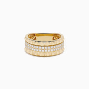 The 14K Yellow Gold Studded Diamond Band features a wide band with a geometric pyramid design and two horizontal rows of small round diamonds set in the center.