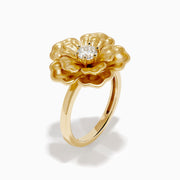 The 14K Yellow Gold Diamond Sculpted Flower Ring features five textured petals and a sparkling round diamond at the center, displayed on a white background.