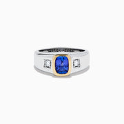 Men's 14K two tone gold ring featuring a cushion cut tanzanite center in a gold bezel setting, flanked by two square diamonds, shown on a plain white background.