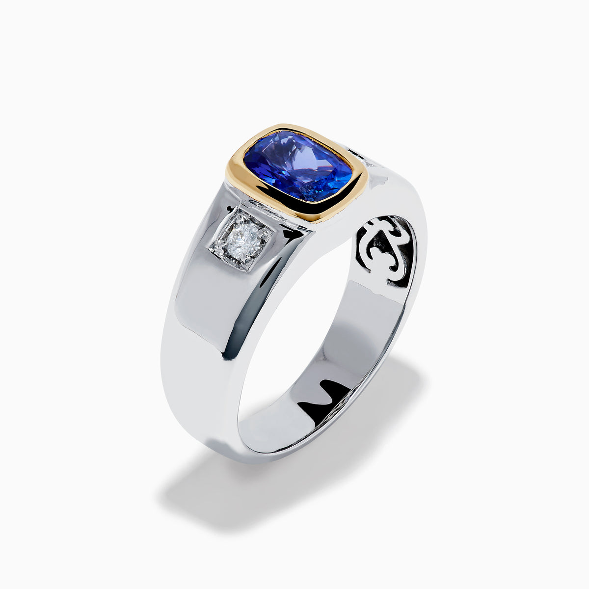 Men's 14K two tone gold ring featuring a cushion cut tanzanite center in a gold bezel setting, flanked by two square diamonds, shown on a plain white background.