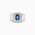 The Men's 14K Two Tone Gold Tanzanite and Diamond Bezel Halo Ring features a rectangular blue tanzanite framed by dazzling white diamonds, set on a bold band for a standout look.