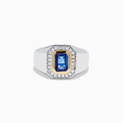 The Men's 14K Two Tone Gold Tanzanite and Diamond Bezel Halo Ring features a rectangular blue tanzanite framed by dazzling white diamonds, set on a bold band for a standout look.