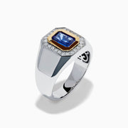 The Men's 14K Two Tone Gold Tanzanite and Diamond Bezel Halo Ring features a rectangular blue tanzanite framed by dazzling white diamonds, set on a bold band for a standout look.