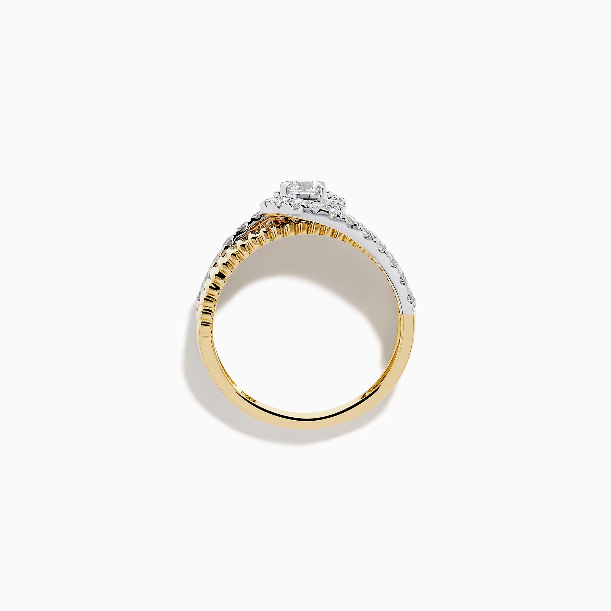 The 14K Two-Tone Diamond Fluted Bypass Ring features a ribbed band with a central round diamond, partly wrapped by a curved row of smaller diamonds.