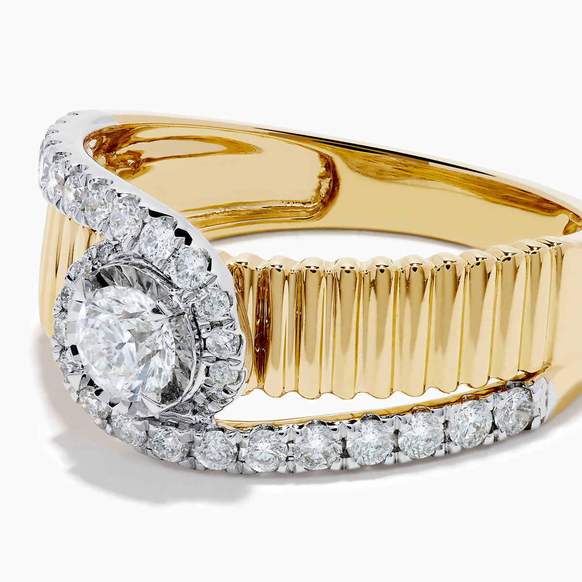 The 14K Two-Tone Diamond Fluted Bypass Ring features a ribbed band with a central round diamond, partly wrapped by a curved row of smaller diamonds.