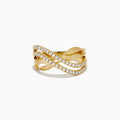 The 14K Yellow Gold Textured Crisscross Diamond Ring features two intertwined, textured gold bands with rows of sparkling diamonds, all set against a white background.