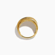 The 14K Yellow Gold Textured Diamond Crossover Ring features overlapping bands—two set with sparkling diamonds and others with brushed texture—for a bold contrast of shine and matte elegance.
