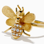 The 14K Yellow Gold Diamond Honeybee Ring features a bee design with textured wings and a striped body accented by sparkling diamonds.