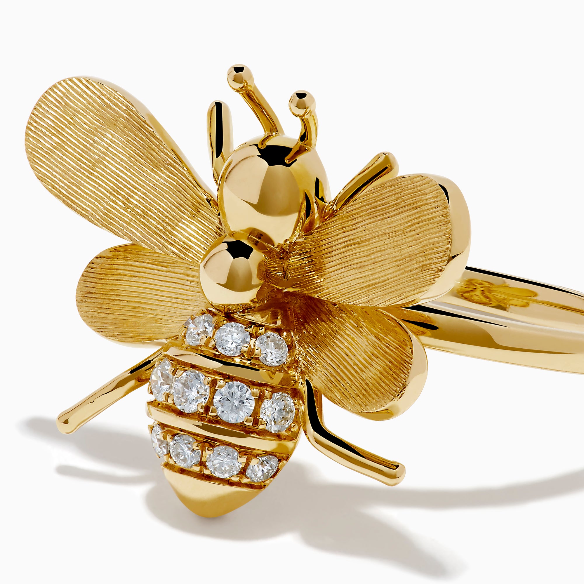 The 14K Yellow Gold Diamond Honeybee Ring features a bee design with textured wings and a striped body accented by sparkling diamonds.
