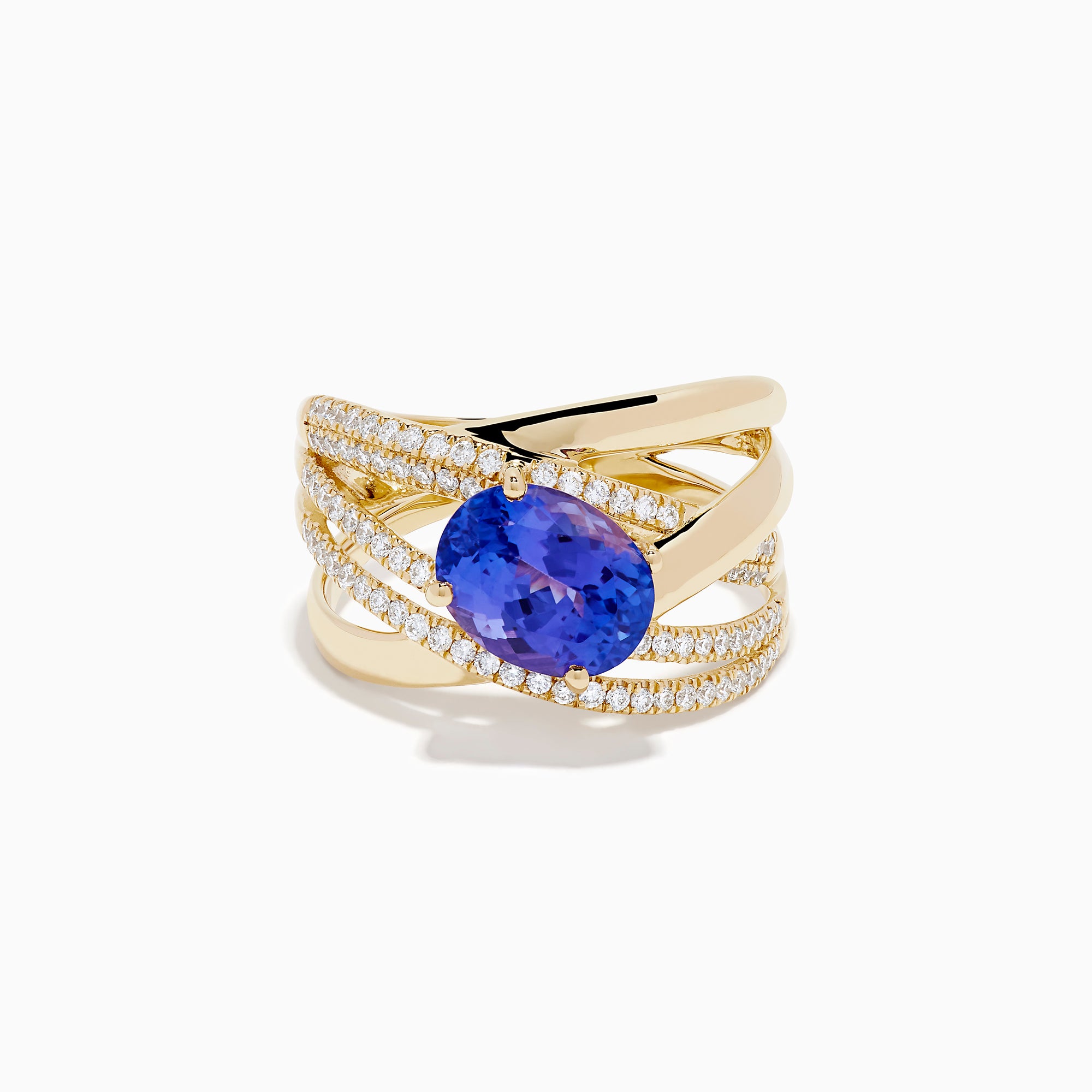 The 14K Yellow Gold Tanzanite and Diamond Crossover Ring showcases an oval tanzanite center stone accented by intersecting diamond-encrusted bands for a brilliant, modern look.