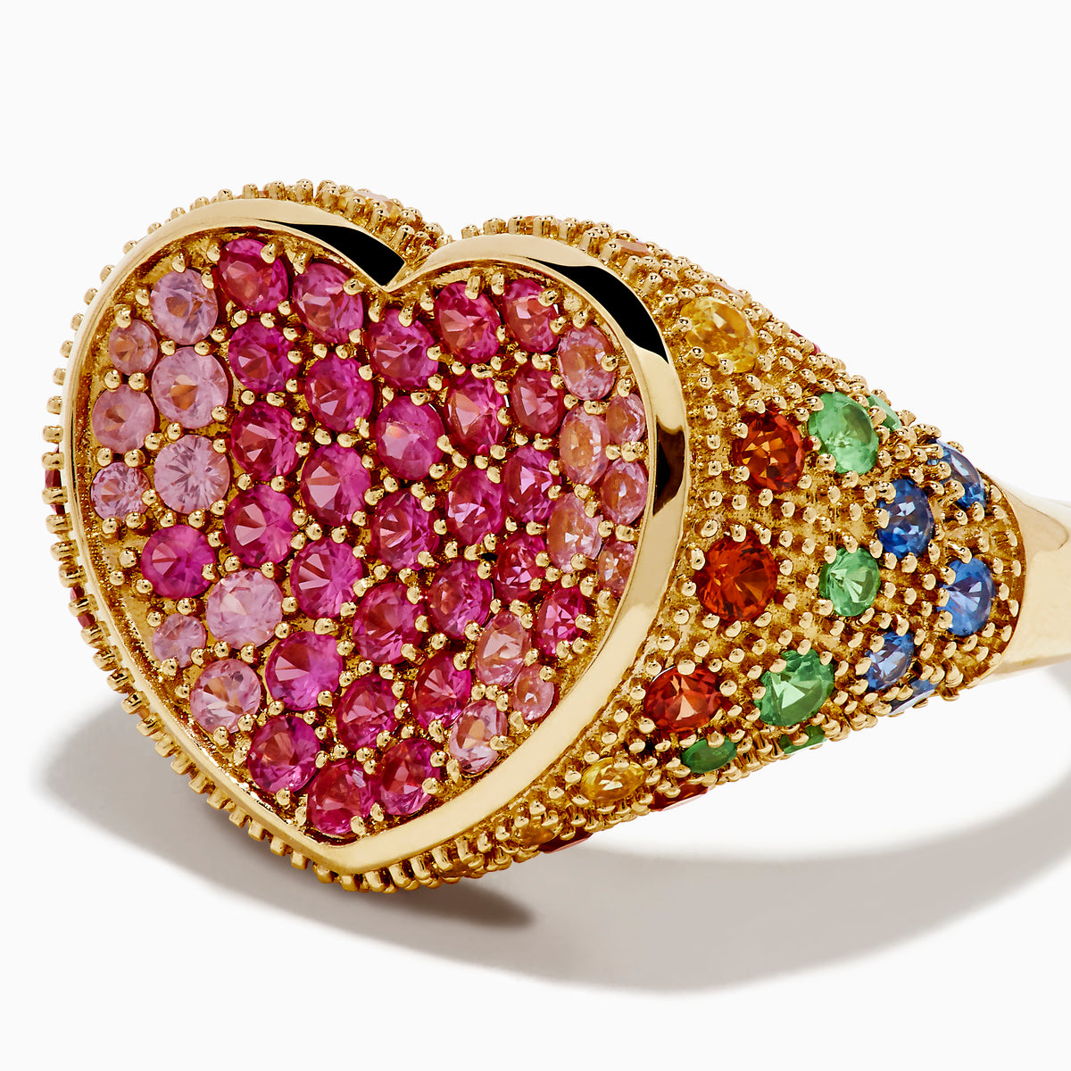 The Watercolors 14K Yellow Gold Multi Sapphire Heart Ring features a heart-shaped design adorned with pink and red sapphires and intricate detailing along the edges and band.