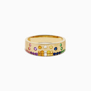 The Watercolors 14K Yellow Gold Multi Sapphire and Diamond Scattered Ring showcases vibrant sapphires in red, yellow, green, blue, and purple hues set across the gold band.