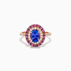 The 14K Rose Gold Tanzanite, Diamond, and Pink Sapphire Oval Halo Ring features a large oval blue tanzanite center, double halos of white diamonds and pink sapphires, plus diamond accents on the band.