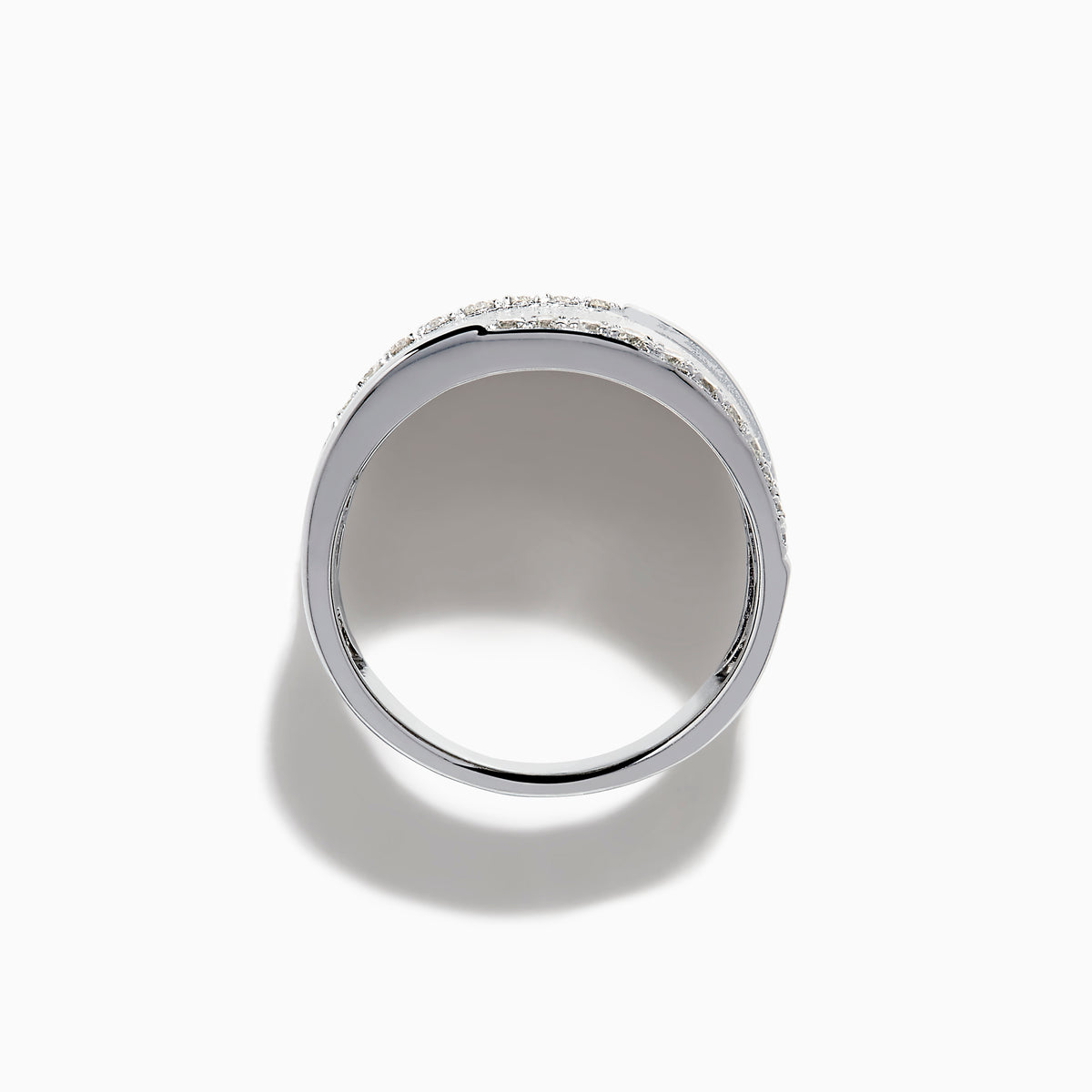 The 925 Sterling Silver Diamond Accented Wide Ring showcases a matte, textured band bordered by curved rows of sparkling diamond accents along its top and bottom edges.