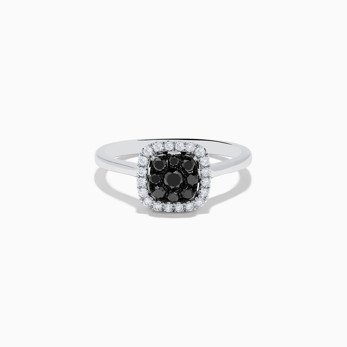 The 14K White Gold White and Black Diamond Ring features a square cluster of black diamonds at the center, bordered by small white gemstones on a sleek band, shown against a white background.