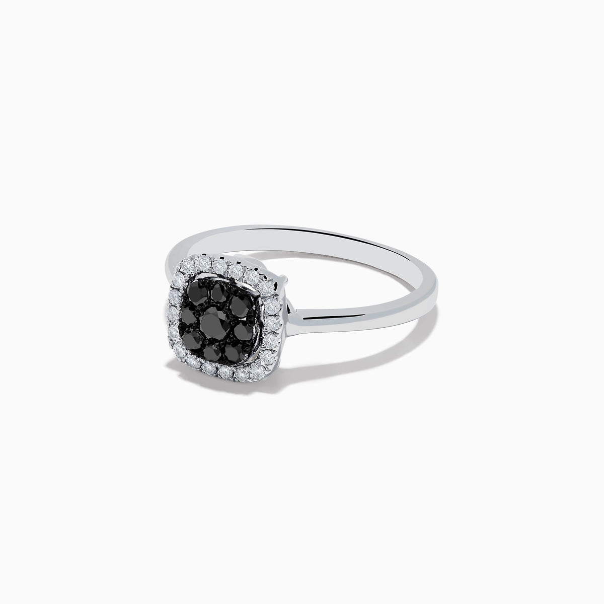 The 14K White Gold White and Black Diamond Ring features a square cluster of black diamonds at the center, bordered by small white gemstones on a sleek band, shown against a white background.