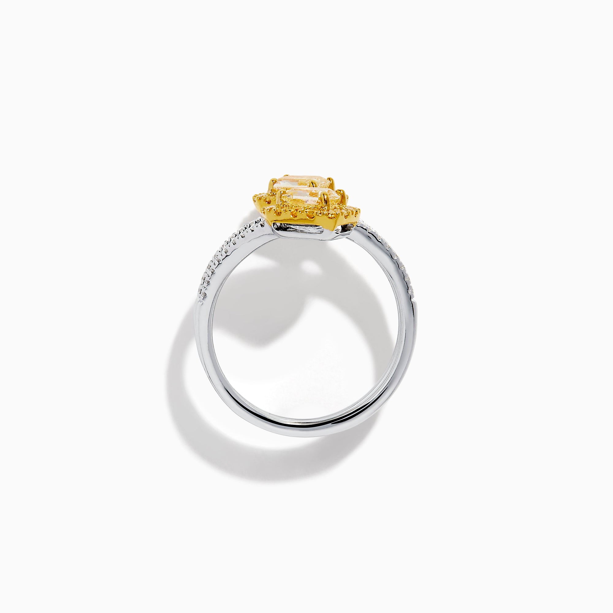 The 18K Two-Tone Gold Yellow and White Diamond Wrap Bypass Ring features two rectangular yellow stones bordered by smaller yellow gems on a spiral band, accented with sparkling white diamonds.