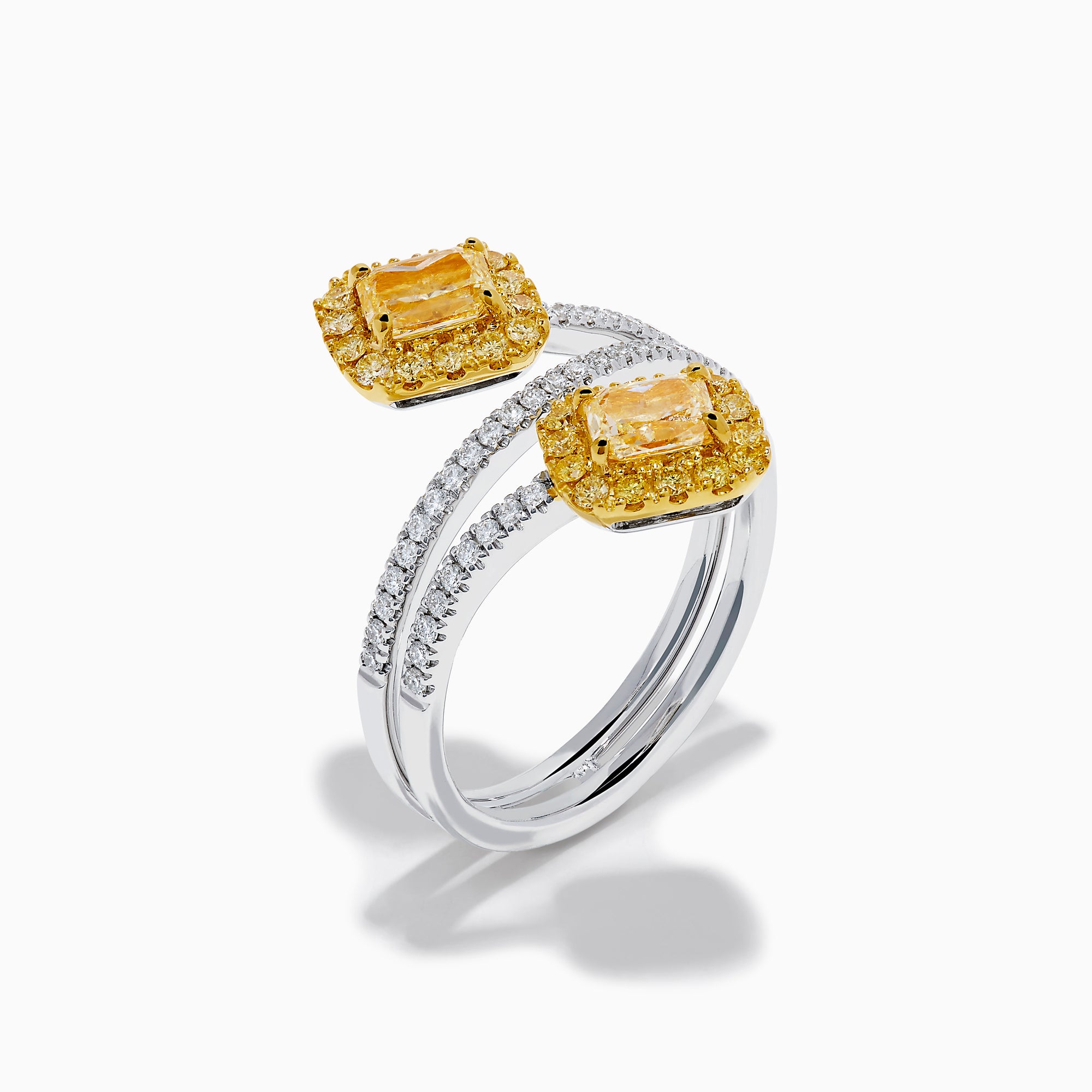 The 18K Two-Tone Gold Yellow and White Diamond Wrap Bypass Ring features two rectangular yellow stones bordered by smaller yellow gems on a spiral band, accented with sparkling white diamonds.