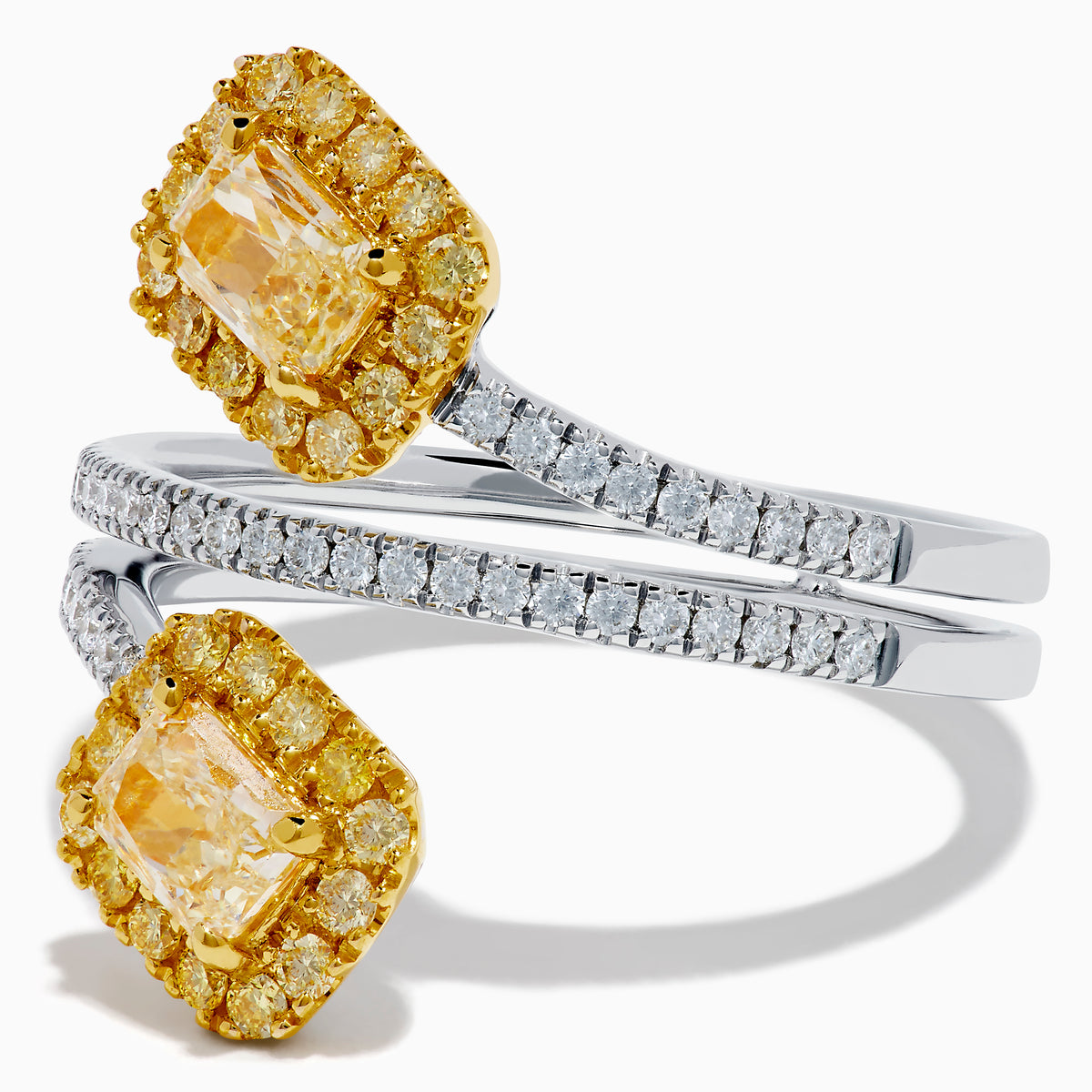 The 18K Two-Tone Gold Yellow and White Diamond Wrap Bypass Ring features two rectangular yellow stones bordered by smaller yellow gems on a spiral band, accented with sparkling white diamonds.