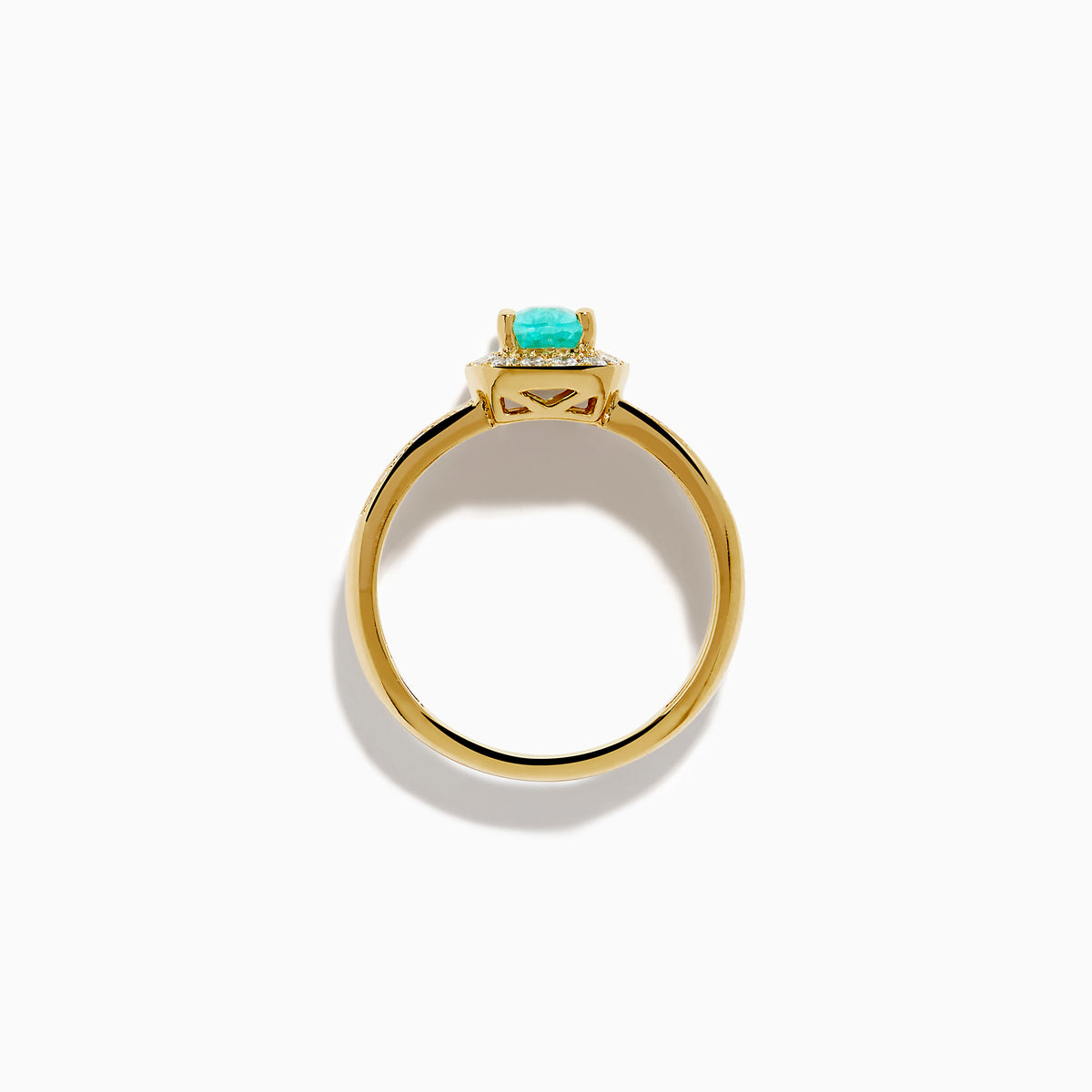 The 18K Yellow Gold Paraiba and Diamond Halo Ring showcases a central oval Paraiba turquoise, surrounded by a diamond halo and additional diamonds on the split shank band, all set in yellow gold and shown against a white background.