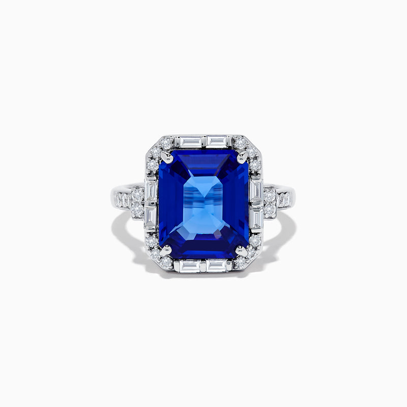 The Nahla Siri 14K White Gold Emerald Cut Tanzanite and Diamond Ring features a large emerald-cut tanzanite center, accented by baguette and round diamonds, displayed on a white background.