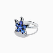 The 925 Sterling Silver Tanzanite and Diamond Starfish Ring features five round tanzanite gemstones and sparkling diamonds along one arm, displayed on a white background.