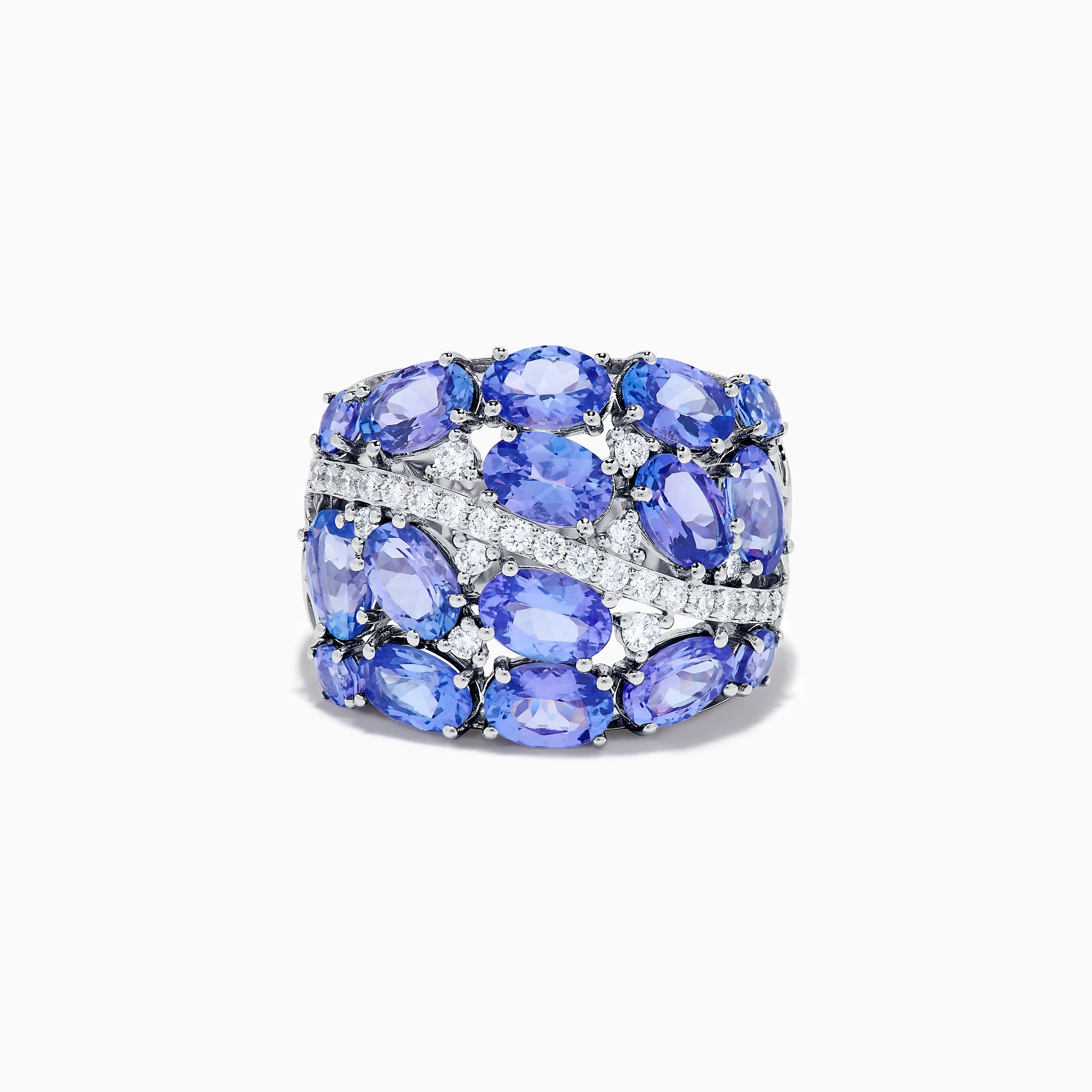 The 14K White Gold Tanzanite and Diamond Statement Ring features multiple oval blue-violet tanzanites and round white diamonds in an elegant, layered design.