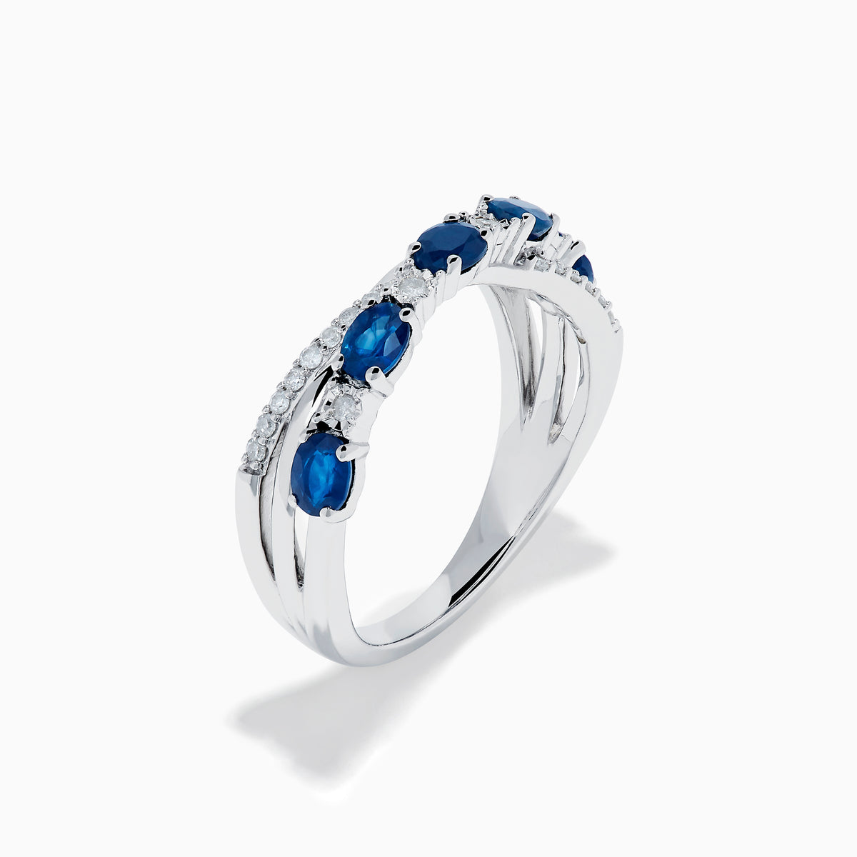 Sterling Silver Oval Blue Sapphire and Diamond Crossover Ring