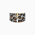 The Signature 14k Yellow Gold Panther Spot Diamond Ring features a wide band with black, brown, and white stones in a leopard pattern, accented by a yellow gold stripe and a diagonal row of white diamonds. Shown on a plain white background.