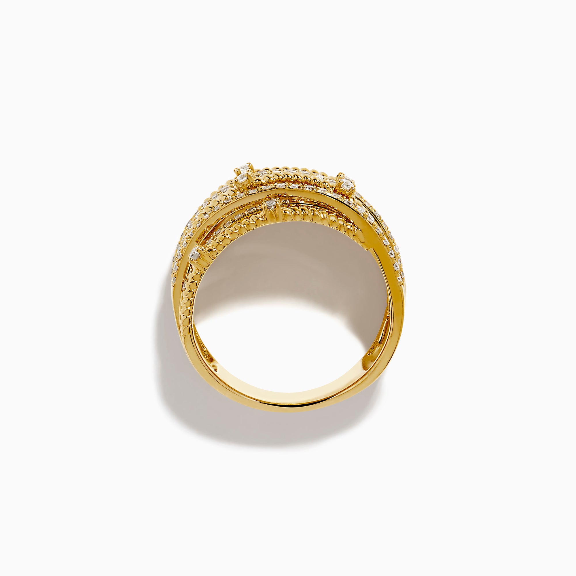 The 14K Yellow Gold Diamond Statement Crossover Ring features multiple overlapping bands with round and baguette diamonds, creating a striking, textured layered look against a white background.