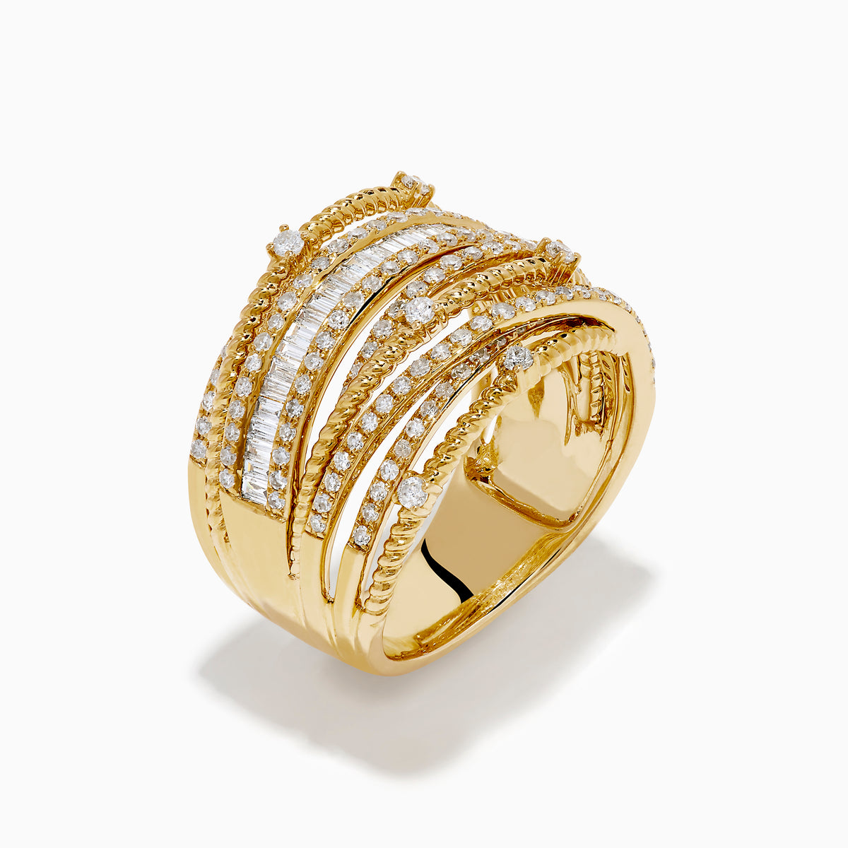 The 14K Yellow Gold Diamond Statement Crossover Ring features multiple overlapping bands with round and baguette diamonds, creating a striking, textured layered look against a white background.
