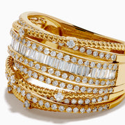 The 14K Yellow Gold Diamond Statement Crossover Ring features multiple overlapping bands with round and baguette diamonds, creating a striking, textured layered look against a white background.