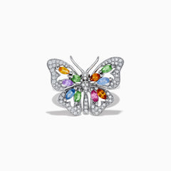 The Watercolors 14K Gold Multi Sapphire and Diamond Butterfly Ring features a silver butterfly with diamond-accented wings and colorful orange, green, blue, and purple sapphires at the center. Shown on a white background.