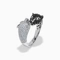 The Signature 14K White and Black Diamond Panther Bypass Ring features a panther head with black diamonds and a body with sparkling white diamonds, elegantly wrapping around the finger for a bold, contrasting look.