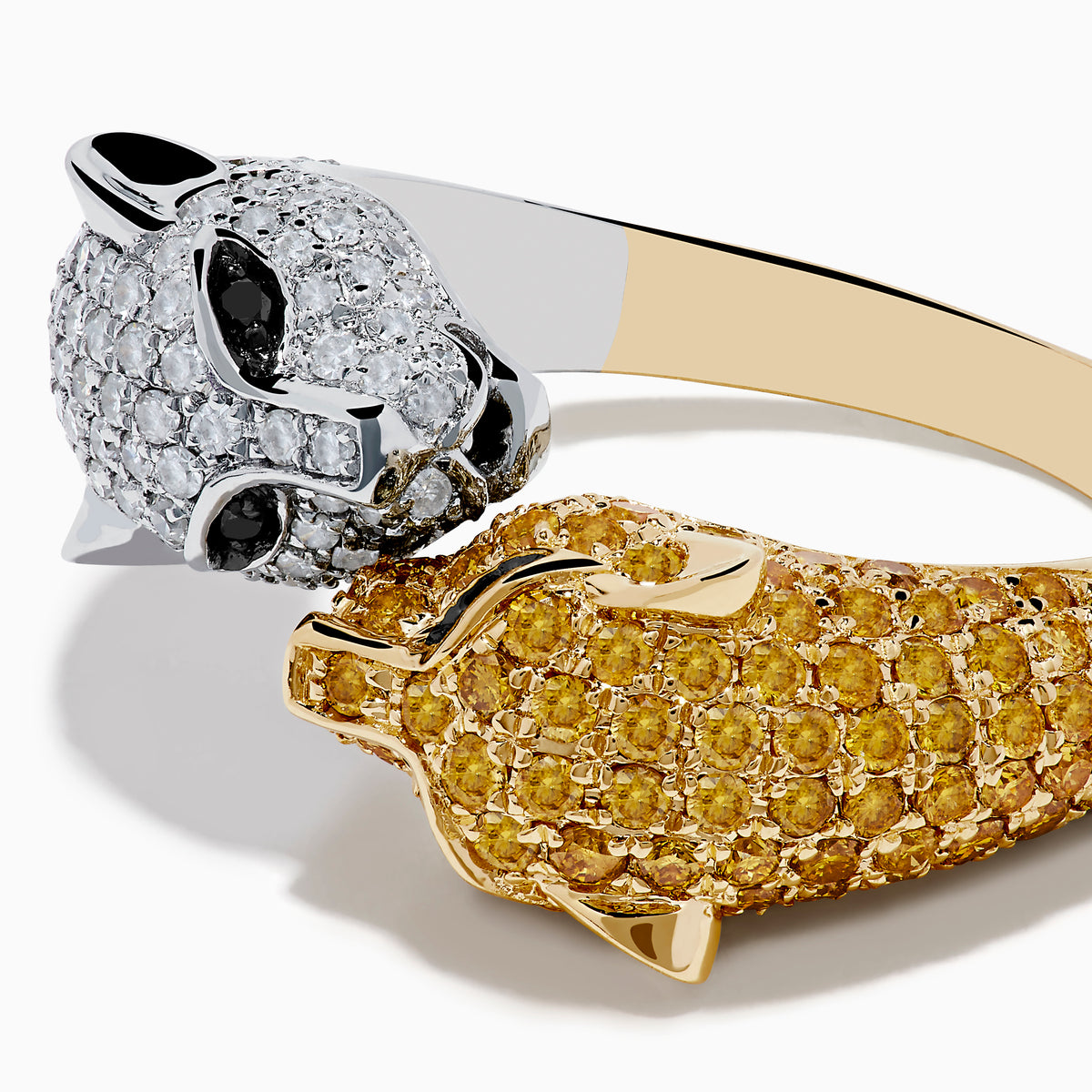 The Signature 14K 2-Tone Gold Bypass Ring features two panther heads set with white, yellow, and black diamonds facing each other for a striking look.