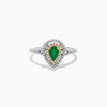 The 14K White and Yellow Gold Pear Shaped Double Diamond Halo Emerald Ring features a vivid emerald center, surrounded by white and yellow diamond halos, with a diamond-adorned band for extra brilliance.