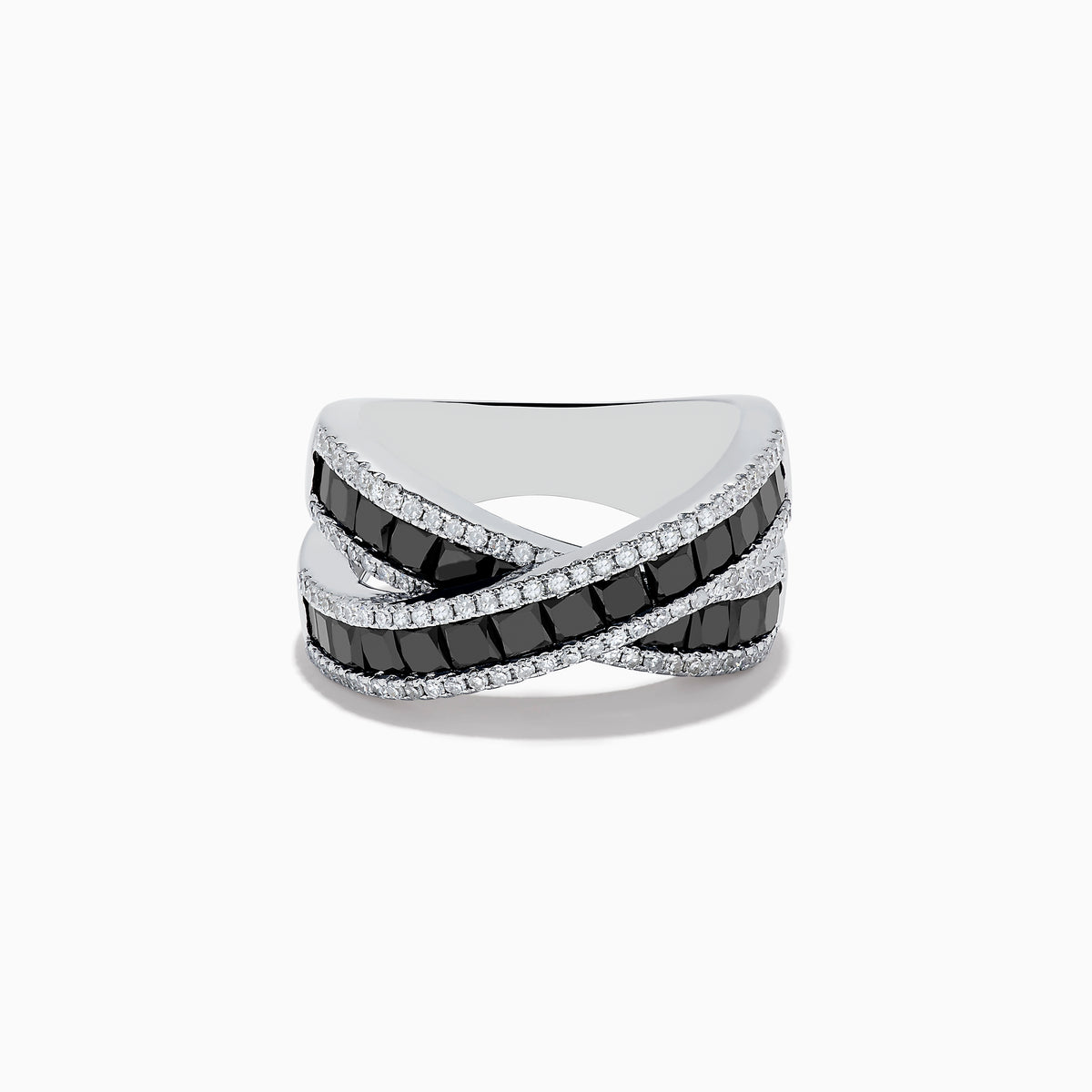 The 14K White Gold Black and White Diamond Crossover Ring features intersecting bands set with rectangular black and white diamonds, accented by rows of small clear stones for a striking crisscross effect.