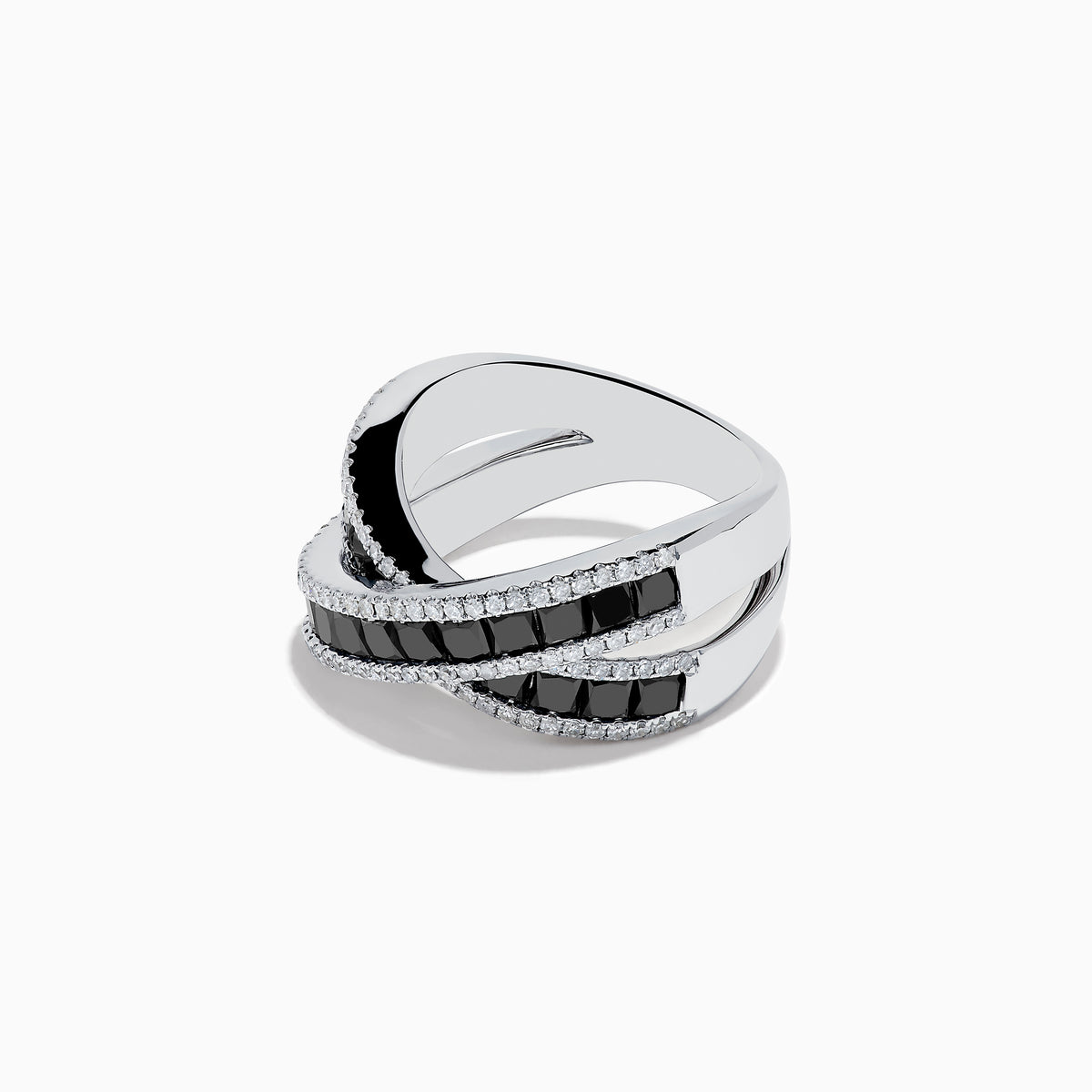 The 14K White Gold Black and White Diamond Crossover Ring features intersecting bands set with rectangular black and white diamonds, accented by rows of small clear stones for a striking crisscross effect.