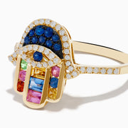 The Novelty 14K Yellow Gold Multi Color Sapphire and Diamond Hamsa Ring features a hand design with diamonds, blue gemstones, and square-cut sapphires in red, green, yellow, and purple on a white background.