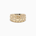 The Doro 14K Yellow Gold Animal Print Diamond Ring features a wide band with an irregular pebble pattern and sparkling diamonds, creating a textured, luxurious animal print-inspired look.