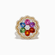 The Watercolors 14K Yellow Gold Multi Sapphire and Diamond Ring features a flower design with sapphire petals, a central white gemstone, and two diamond layers in a scalloped border.