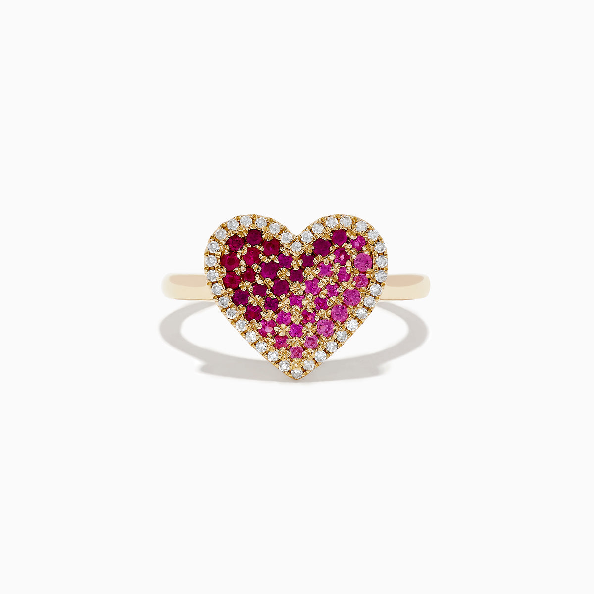 The Novelty 14K Yellow Gold Pink Sapphire, Ruby and Diamond Heart Ring features a heart-shaped design with central pink sapphire and ruby gemstones, surrounded by small white diamonds and shown on a white background.