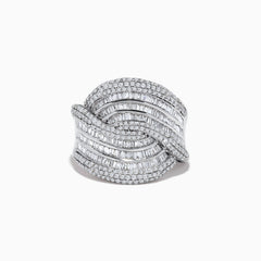 The 14K White Gold Diamond Statement Ring features overlapping, wavy rows of baguette and round diamonds, creating an elegant, textured design against a plain white background.