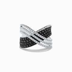The 14K White Gold White and Black Diamond Criss Cross Ring features an overlapping wide band with alternating rows of black and white diamonds set in polished white gold.