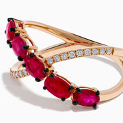The 14K Rose Gold Diamond and Natural Ruby Criss Cross Ring features five oval red rubies on one band and small white diamonds on the other, set against a white background.