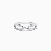 The Trio 14K 3-Tone Gold Diamond Stackable Crossover Rings Set of 3 features yellow, white, and rose gold bands, each with a crossover infinity design and sparkling diamond accents—perfect for stacking or wearing individually.