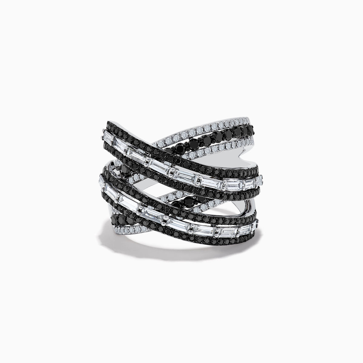 The 14K White Gold Black and White Diamond Criss Cross Ring features overlapping bands set with alternating rows of black and white diamonds for a striking, modern look.